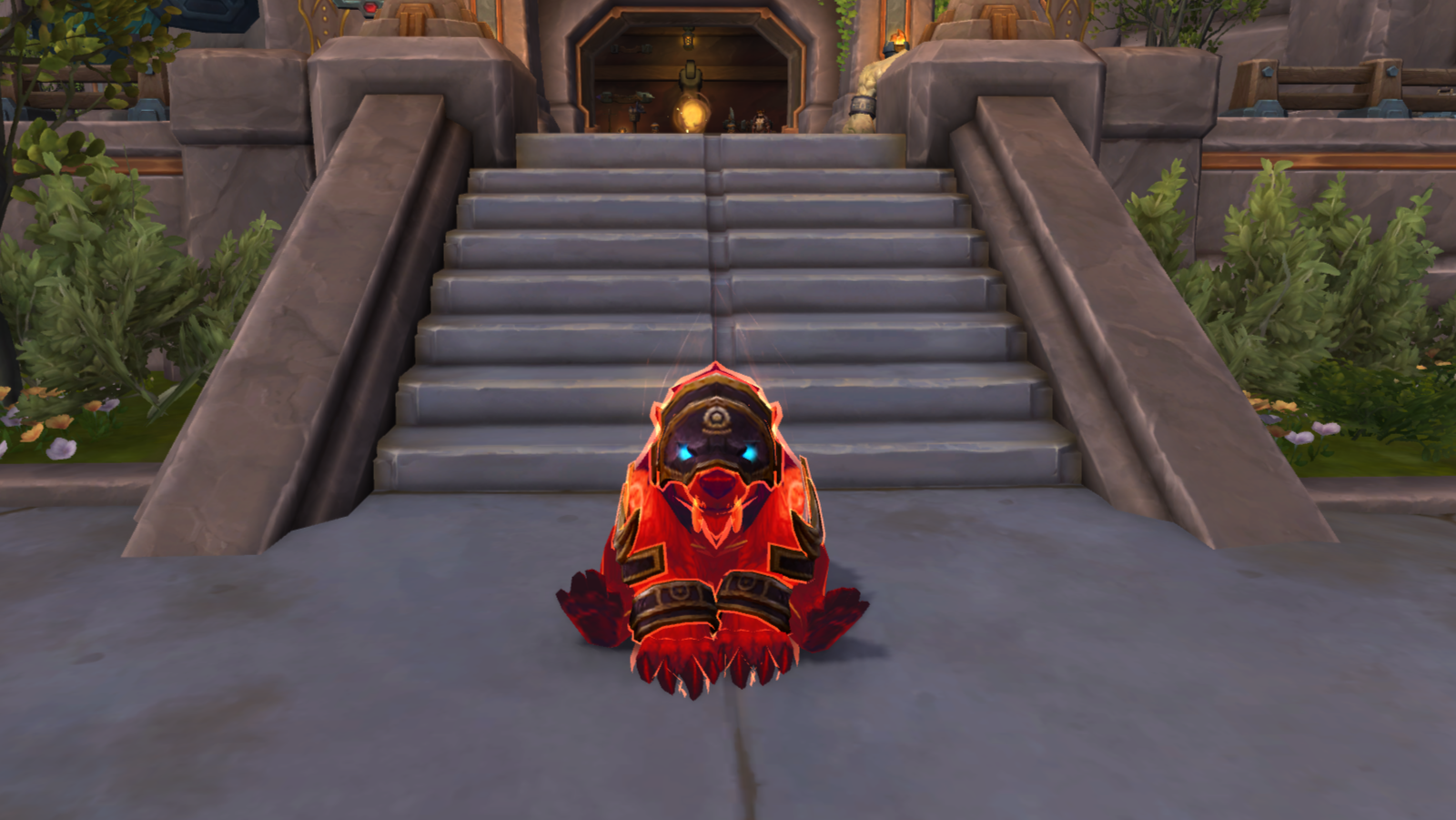 Sur cette image on peut apercevoir un ours assis devant le téléporteur pour les donjons Mythique+